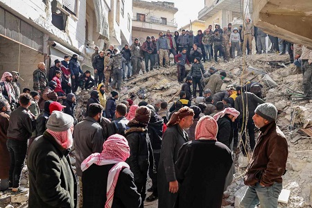 Photo on this page: Rescue workers search for survivors in Salqin, Idlib province, Syria. Source: Le Monde.